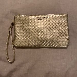 Gold hand clutch purse with phone charger